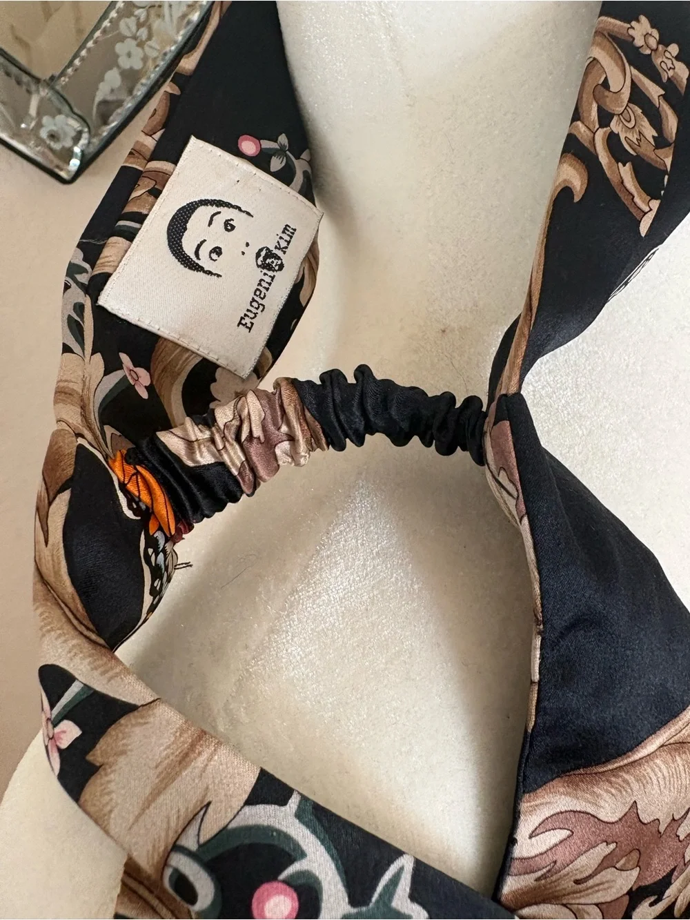 Eugenia Kim Black Silk Scarf with Beige Floral & Orange Butterfly Motif